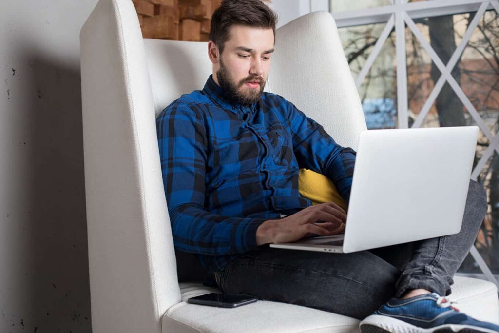 man on his laptop